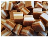 LOLLIES CAROUSEL 2KG JERSEY CARAMELS